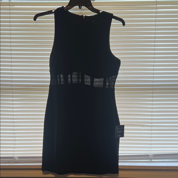 Lulus Dresses & Skirts - Lulu's Black Dress with Sheer Waist Detail